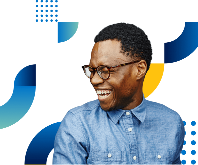 Image of a man with glasses laughing.